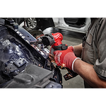 Worker using the M12 FUEl Bandfile for automotive use