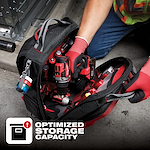 App%20Shot%20Overlay tool bag highlighting optimized storage capacity, shown with various red and black power tools and accessories.