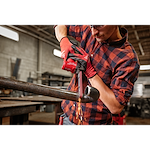 Image of the Milwaukee M12 FUEL 1/2" X 18" Bandfile being used by a worker on a pipe