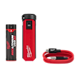 The REDLITHIUM™ USB Charger and Portable Power Source Kit includes a black and red USB 3.0 battery, a red charger with Milwaukee branding, and a coiled red USB cable with black connectors.