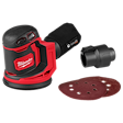 Milwaukee cordless random orbit sander with red and black color scheme. The sander includes a dust bag, an attachment, and three circular sanding pads. The Milwaukee logo is visible prominently on the side of the tool.