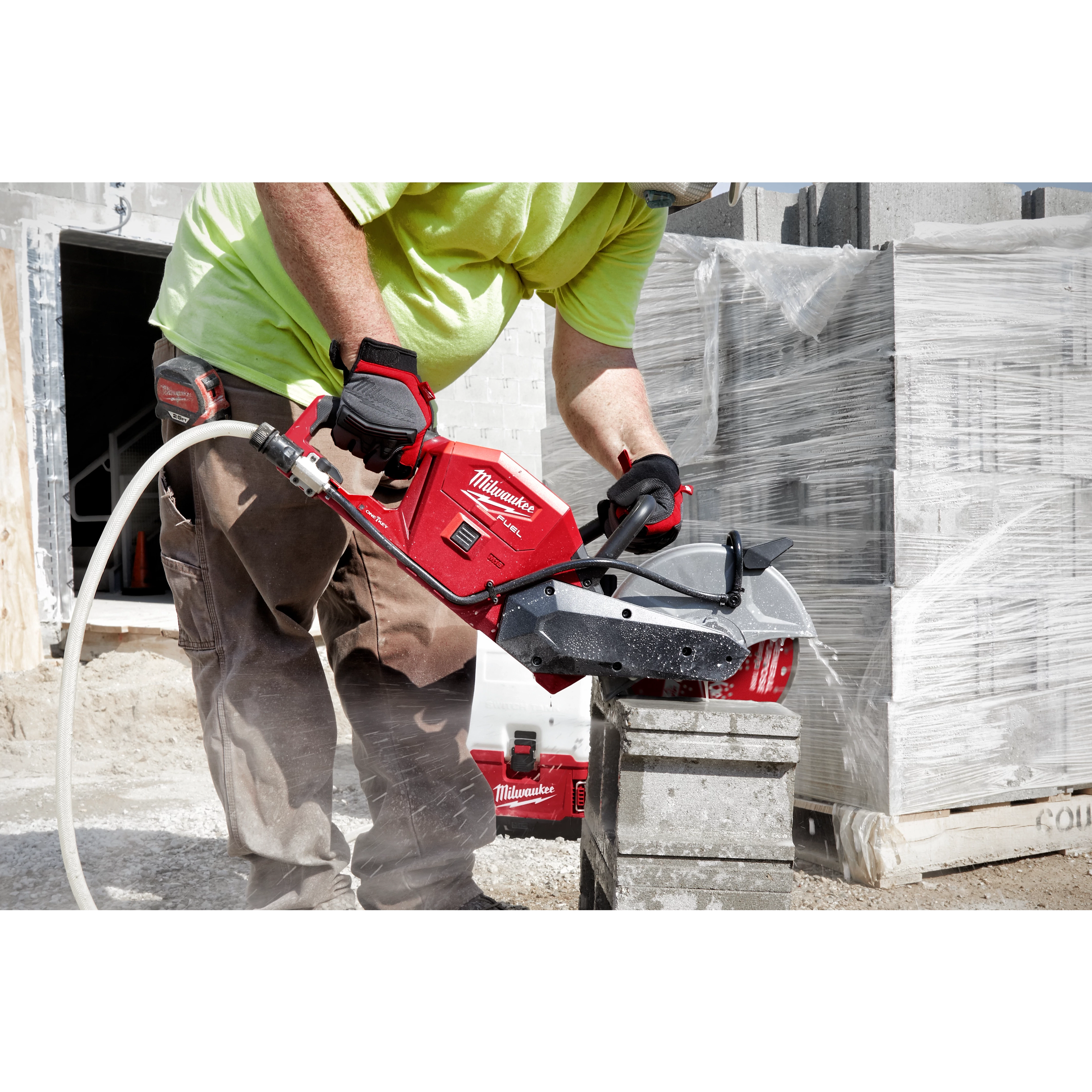 Image of the 9" DIAMOND MAX Segmented Turbo, General Purpose Diamond Blade being used by a worker on a jobsite to cut concrete block